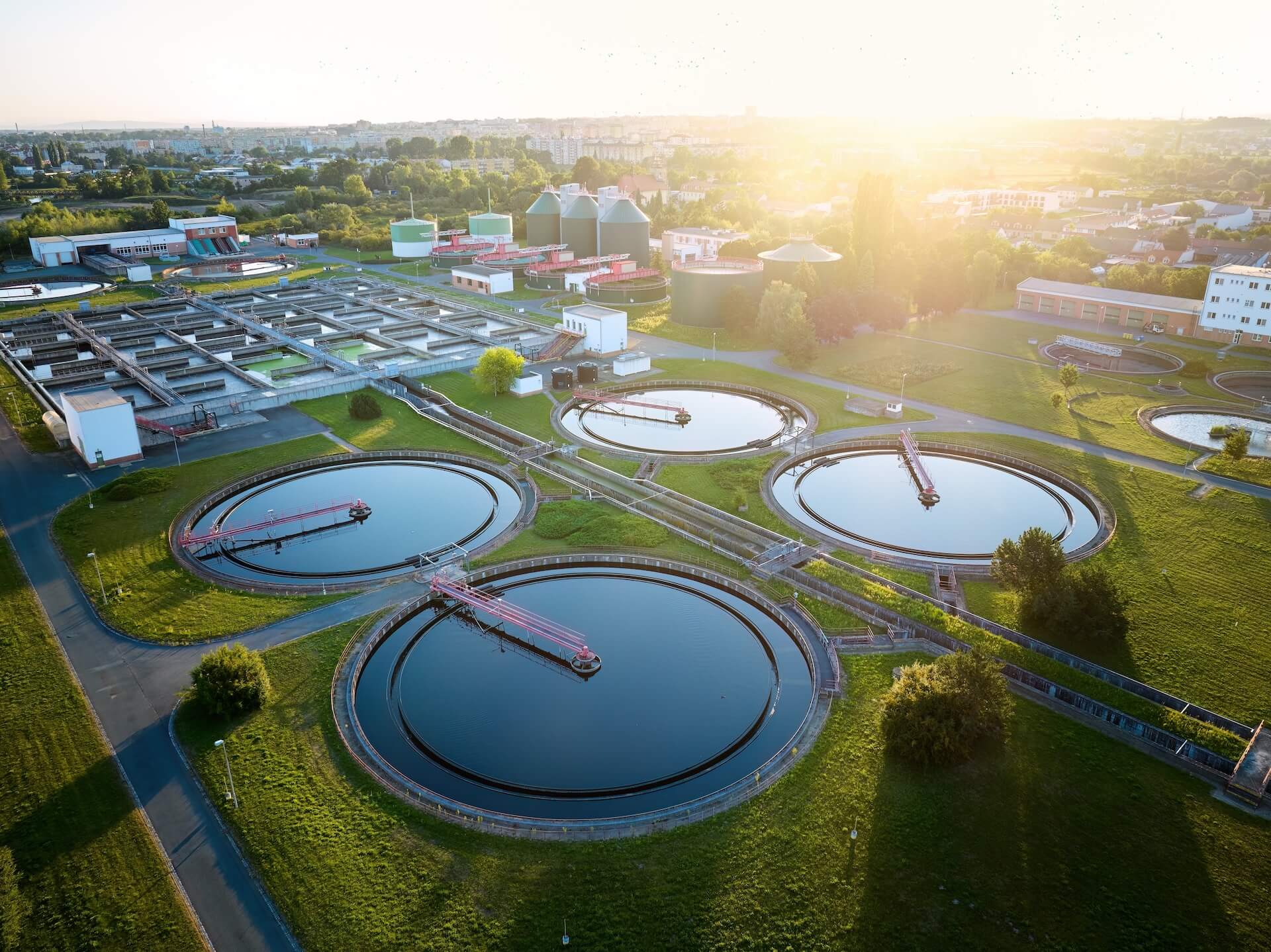 Aerial,View,Of,Wastewater,Treatment,Facility,At,Sunrise.,Ideal,For